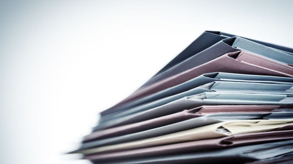 Pile of business document files