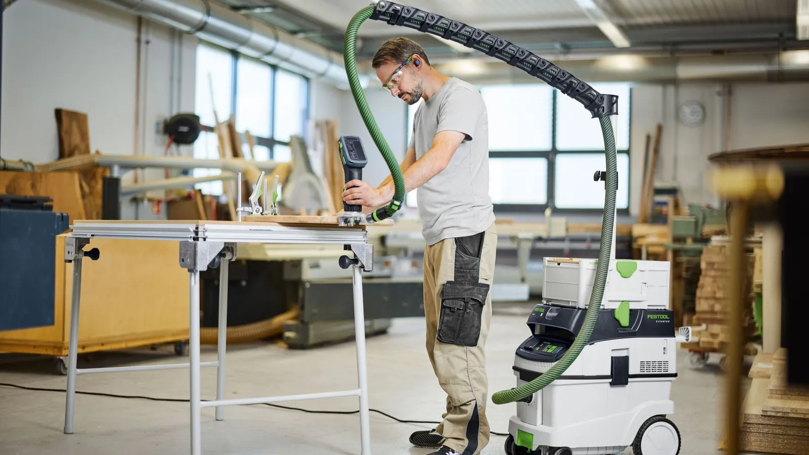 Der Absaugarm CT-ASA FLX J mobil für die Baustelle mit Befestigung auf CT-Sauger.