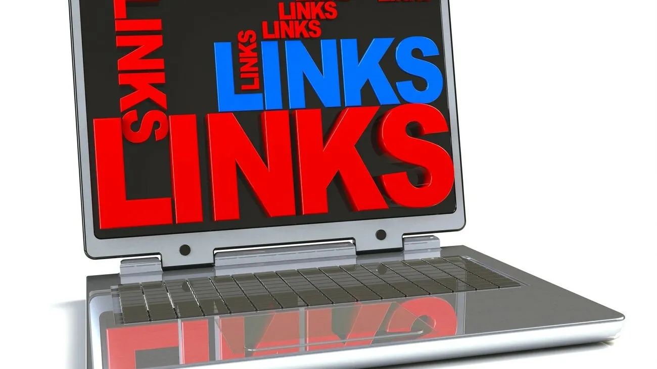 Ein illustrierter Laptop mit dem Wort "Links" in rot und blau quer und wirr auf dem Display verteilt.