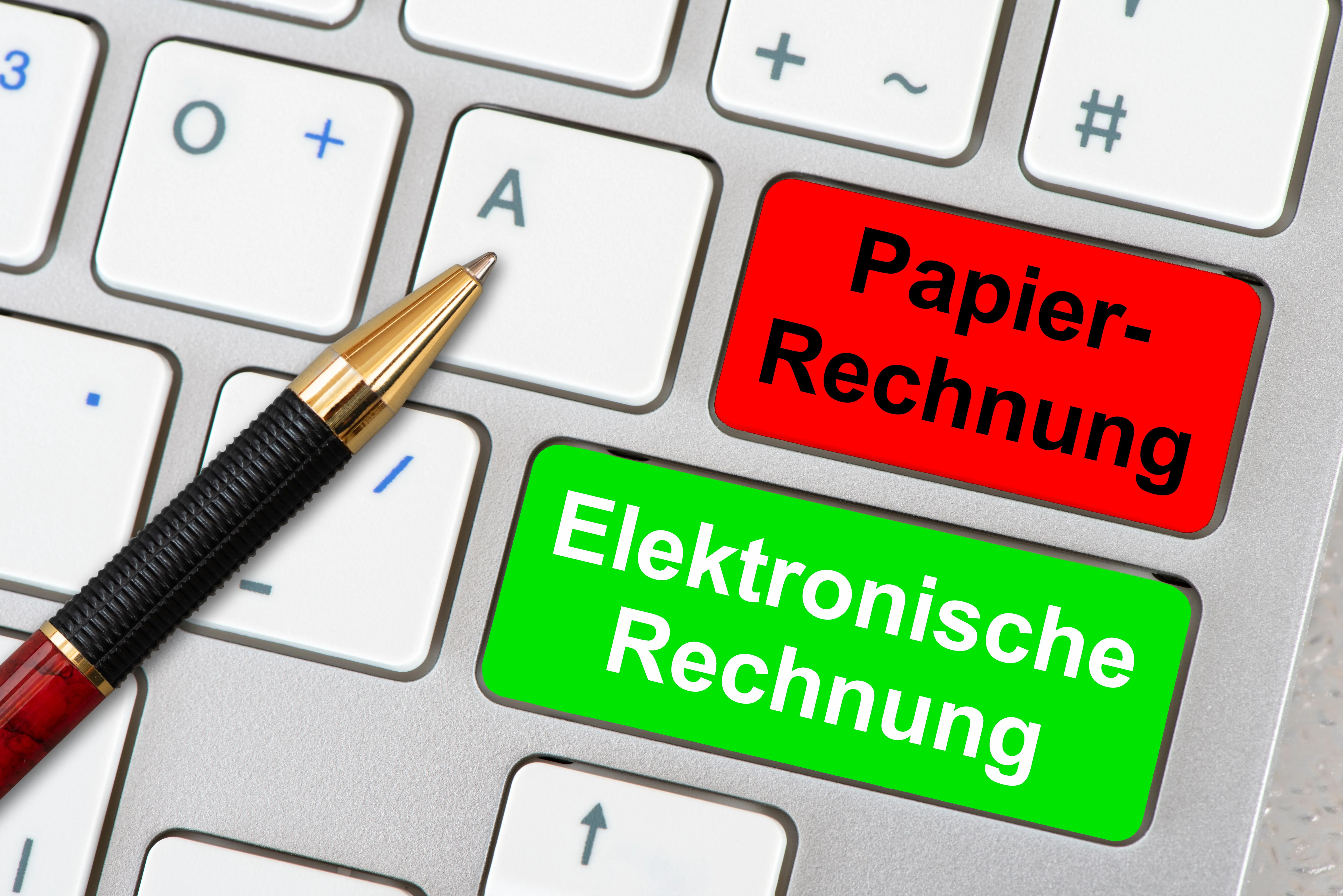 Eine Tastatur eine Computers: Darauf sind sind die Tasten "Elektronische Rechnung" und "Papier-Rechnung" zu finden.