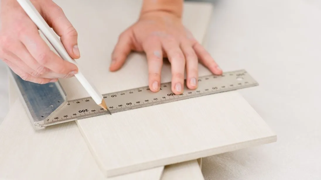 Home improvement - handywoman measuring tile