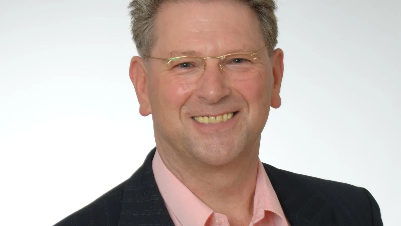 Porträtfoto von Coach Helmut Heim.