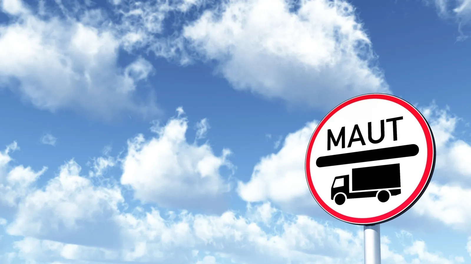 Verkehrsschild "Maut" auf weißem Hintergrund. Dahinter ist ein blauer Himmel mit Wolken.