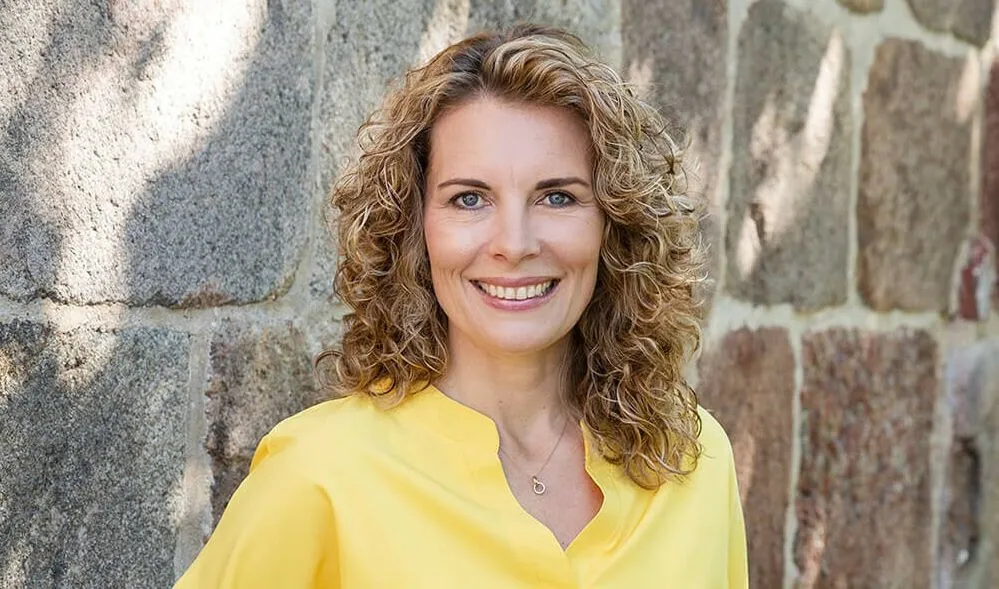 Porträt von Coach Maren Ulbrich, die auch als "Handwerksmensch" bekannt ist