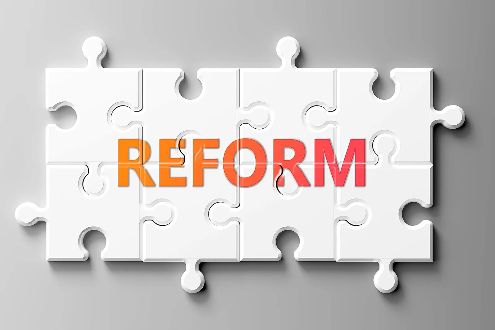 Ein Puzzle auf dem das Wort Reform steht.